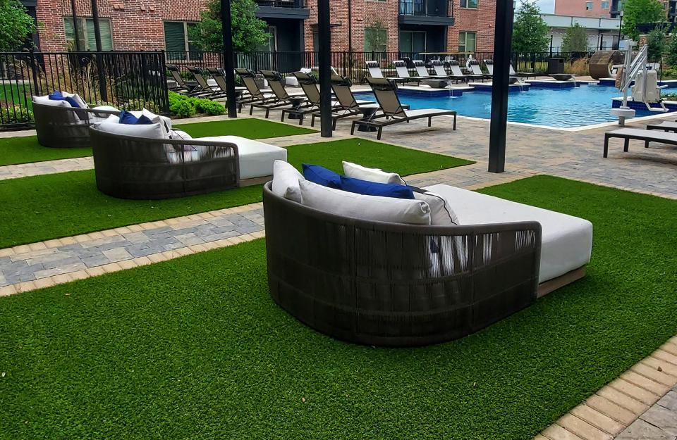 Synthetic grass installed poolside at a hotel