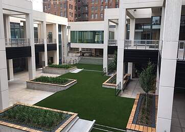 Courtyard installed with synthetic grass
