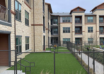 Artificial grass lawn at a luxury apartment courtyard