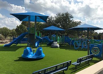 Safe playground turf installed a park playground