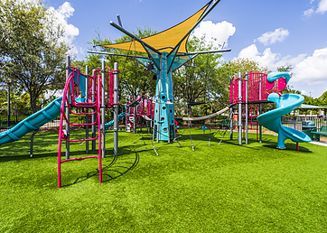 Park playground installed with artificial grass