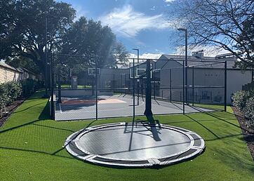 Backyard multi-sport game court and artificial grass lawn