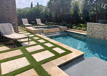 Artificial grass installed as a pool surround